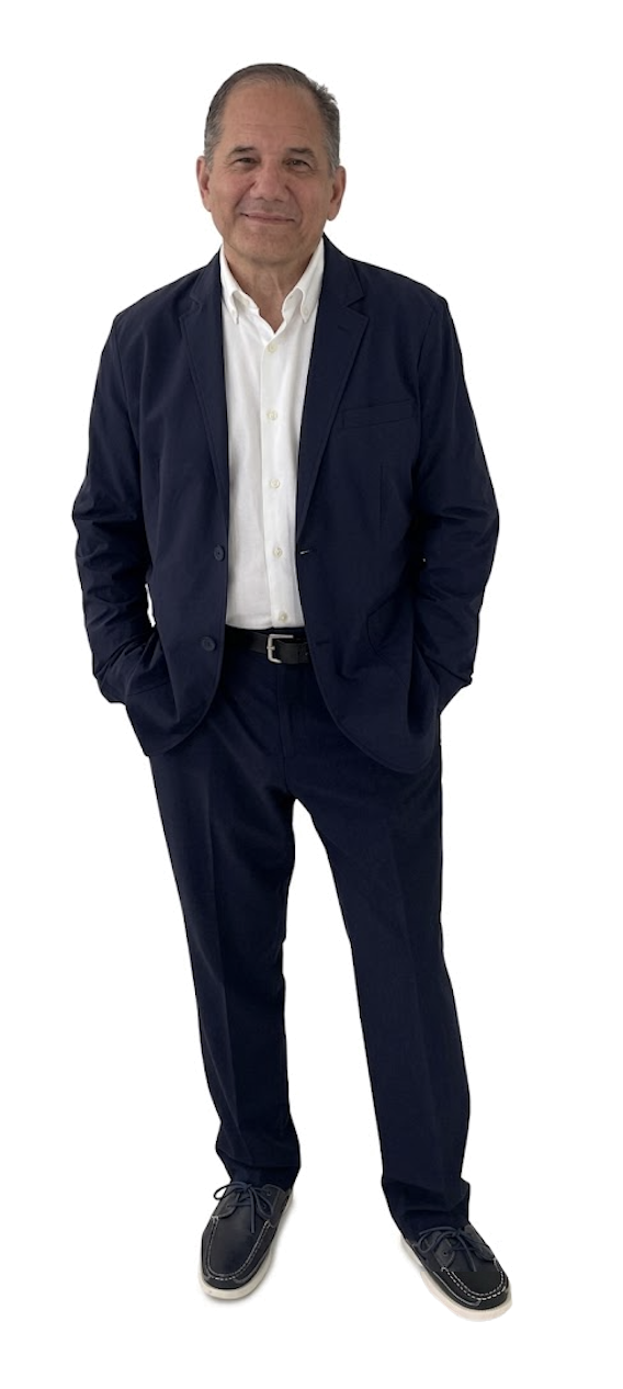 Charles Zakarin standing in a navy suit